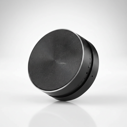 Black cylindrical speaker on a white background