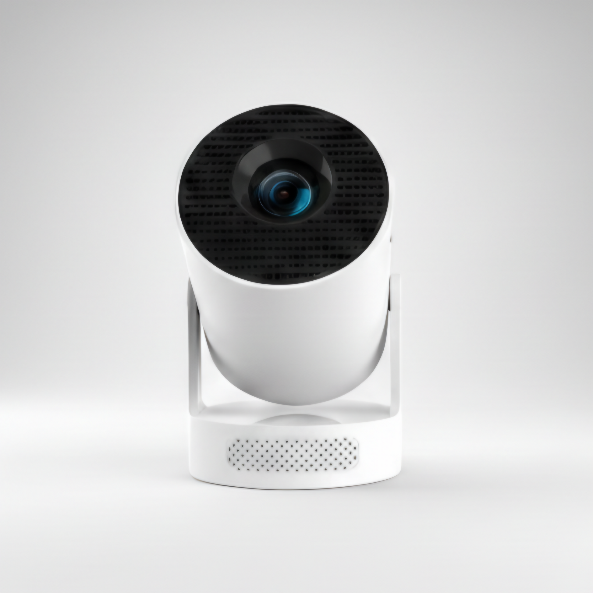 A straight-on studio shot of a white, cylindrical smart home security camera or smart projector. The device features a black front panel with a textured grille surrounding the central lens, which has a blue reflection. The main body swivels on a minimalist white stand attached to a round base that contains a series of small speaker or microphone holes near the bottom. This image is optimized for keywords such as home security camera, smart device, indoor camera, wireless projector, modern electronics, and 